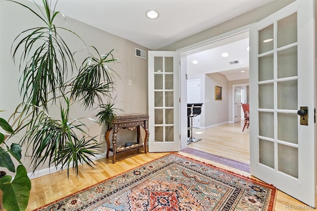 901 S Leyden St, Denver, CO 80224 - unfurnished room featuring french doors, wood finished floors, and recessed lighting
