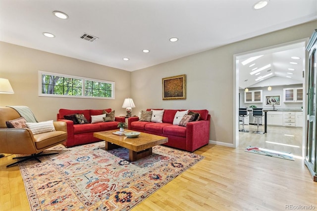 901 S Leyden St, Denver, CO 80224 - living room with recessed lighting and light wood-type flooring