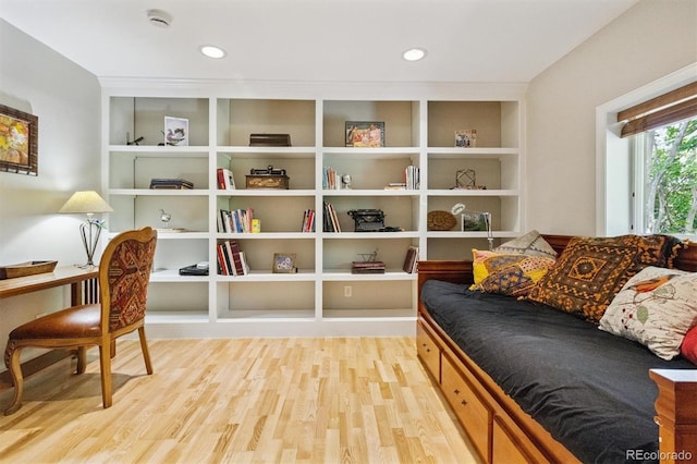 901 S Leyden St, Denver, CO 80224 - living area with wood finished floors, an office area, built in shelves, and recessed lighting