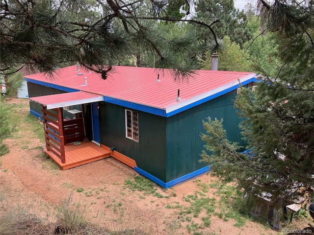 exterior space featuring a wooden deck