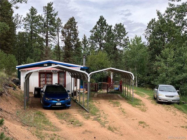 view of front of house with a carport