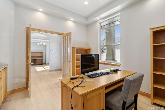 office space with light wood-style floors, baseboards, a notable chandelier, and recessed lighting