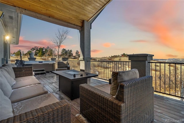 wooden deck with an outdoor hangout area