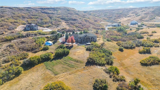 drone / aerial view featuring a mountain view