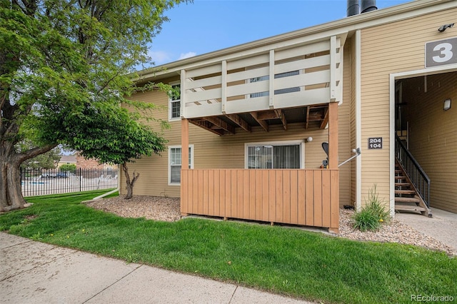 10251 W 44th Ave Unit 3-204, Wheat Ridge, CO 80033 - view of property exterior featuring stairs