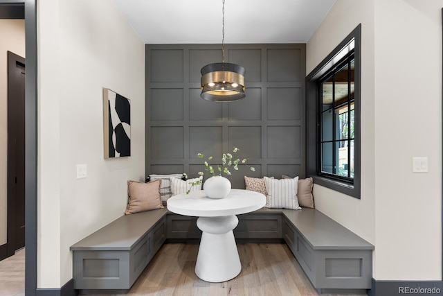 1100 S Elizabeth St, Denver, CO 80210 - dining space featuring breakfast area, light wood finished floors, and a decorative wall