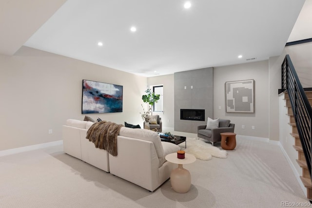 1100 S Elizabeth St, Denver, CO 80210 - living room with visible vents, stairs, baseboards, light colored carpet, and recessed lighting