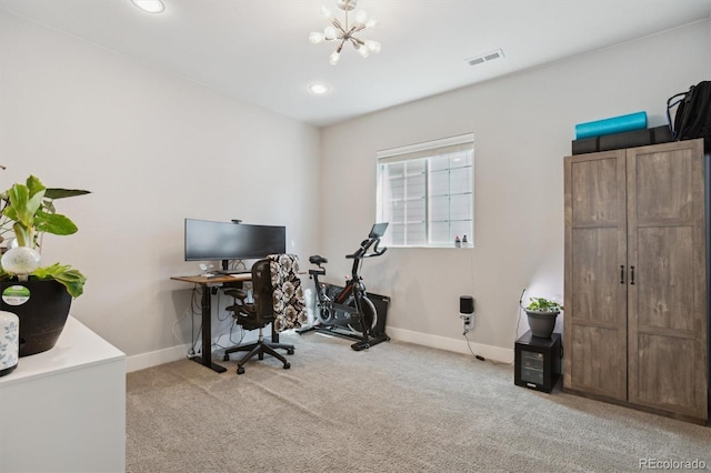 office featuring a chandelier, visible vents, carpet flooring, and baseboards