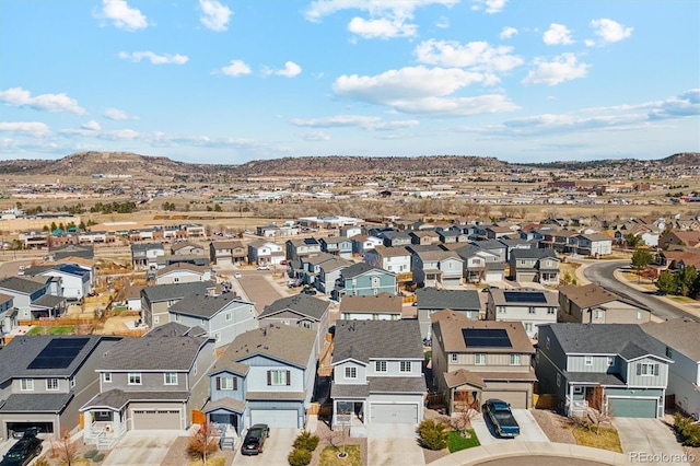 aerial view featuring a mountain view and a residential view