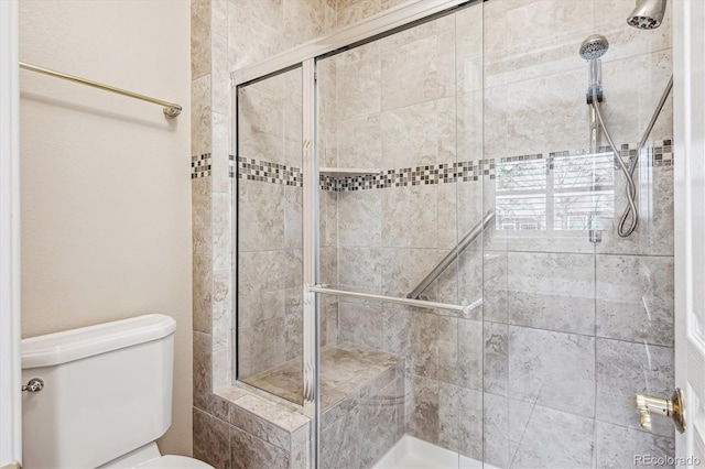 1844 S Jay Way, Lakewood, CO 80232 - bathroom featuring toilet and a stall shower