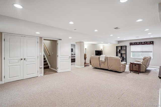 1844 S Jay Way, Lakewood, CO 80232 - living area with carpet, baseboards, and stairs