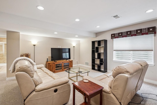 1844 S Jay Way, Lakewood, CO 80232 - living area with baseboards, recessed lighting, and light colored carpet
