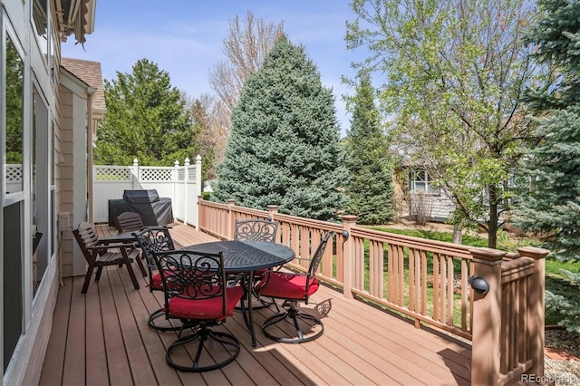 1844 S Jay Way, Lakewood, CO 80232 - wooden terrace featuring outdoor dining area