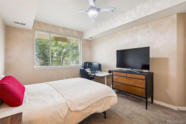 8778 S Kipling Way Unit 304, Littleton, CO 80127 - carpeted bedroom featuring baseboards and ceiling fan