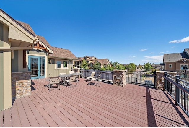 8778 S Kipling Way Unit 304, Littleton, CO 80127 - deck with outdoor dining space and a residential view