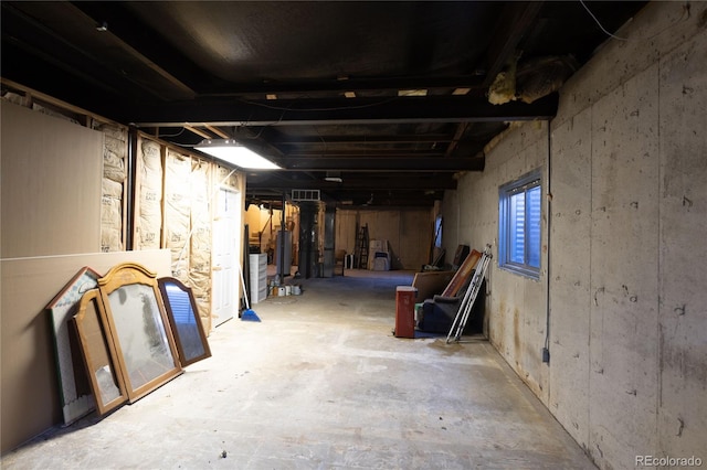 basement featuring water heater