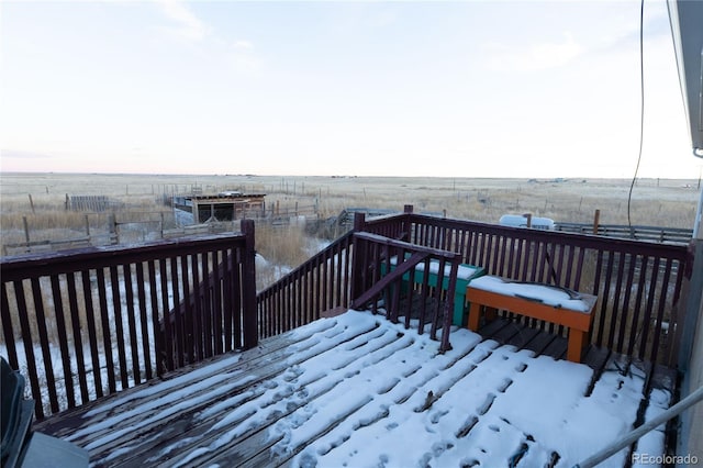 wooden terrace with a rural view