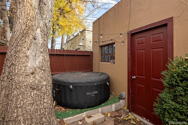 view of patio featuring a hot tub