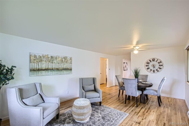 5563 Newland Way, Arvada, CO 80002 - living room with light wood-type flooring and a ceiling fan