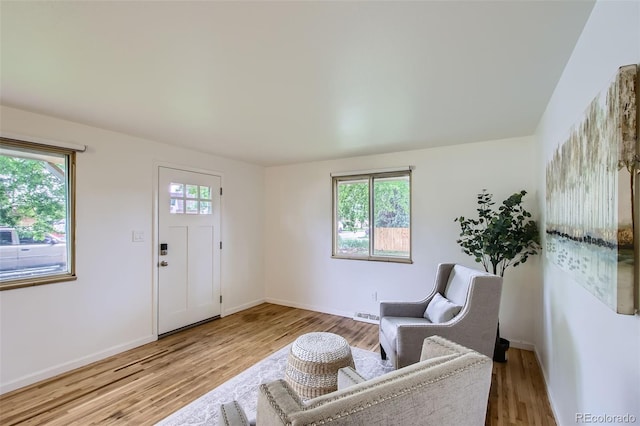 5563 Newland Way, Arvada, CO 80002 - entrance foyer with wood finished floors and baseboards