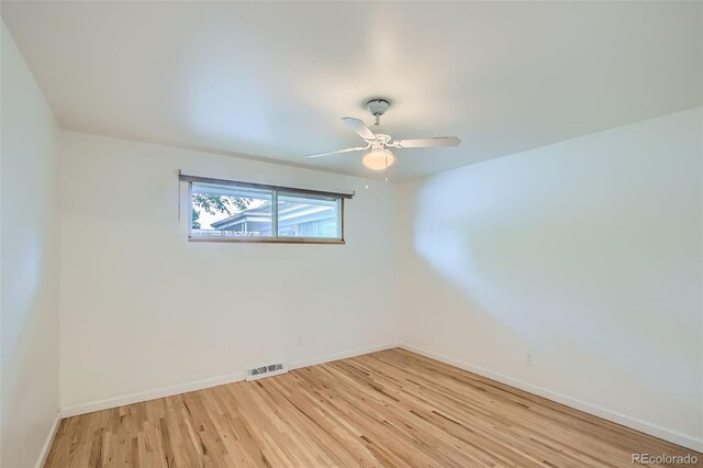 5563 Newland Way, Arvada, CO 80002 - empty room featuring light wood-style floors and ceiling fan