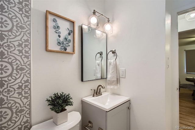5563 Newland Way, Arvada, CO 80002 - bathroom with toilet and vanity