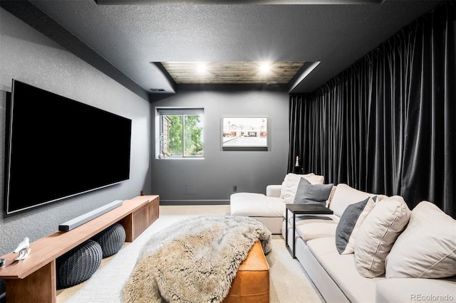 600 Cascade Dr, Golden, CO 80403 - cinema room with a textured ceiling, carpet floors, and baseboards