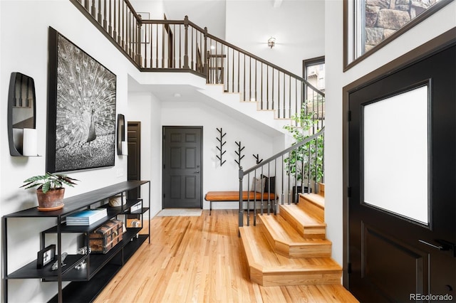600 Cascade Dr, Golden, CO 80403 - entryway featuring a high ceiling, stairs, and light wood-style floors