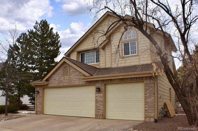 view of front of property with a garage