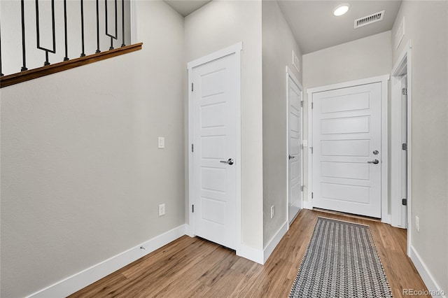 1575 W 68th Ave, Denver, CO 80221 - entrance foyer featuring light wood-type flooring and baseboards