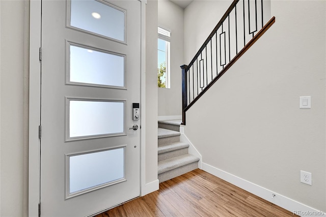 1575 W 68th Ave, Denver, CO 80221 - foyer entrance featuring stairway and wood finished floors