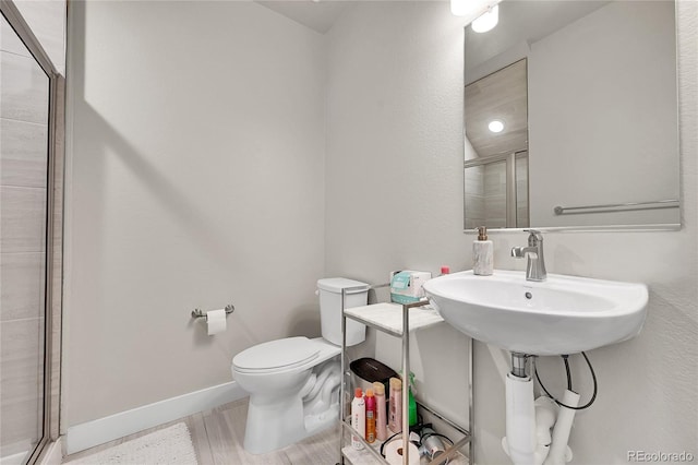 1575 W 68th Ave, Denver, CO 80221 - full bath featuring a stall shower and wood finished floors