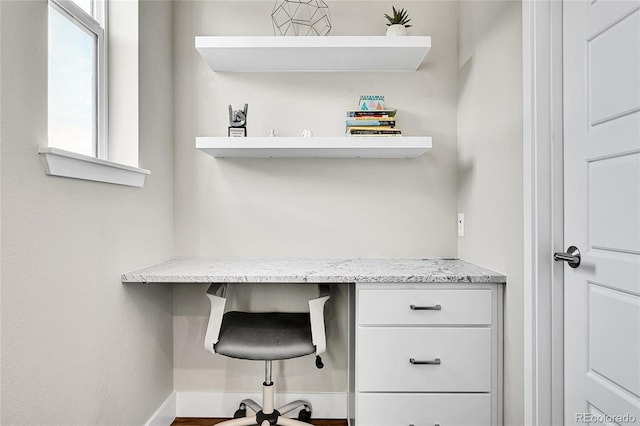 1575 W 68th Ave, Denver, CO 80221 - unfurnished office featuring built in study area and baseboards