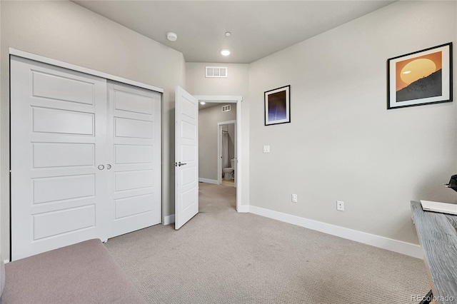 1575 W 68th Ave, Denver, CO 80221 - unfurnished bedroom featuring light colored carpet, a closet, and recessed lighting