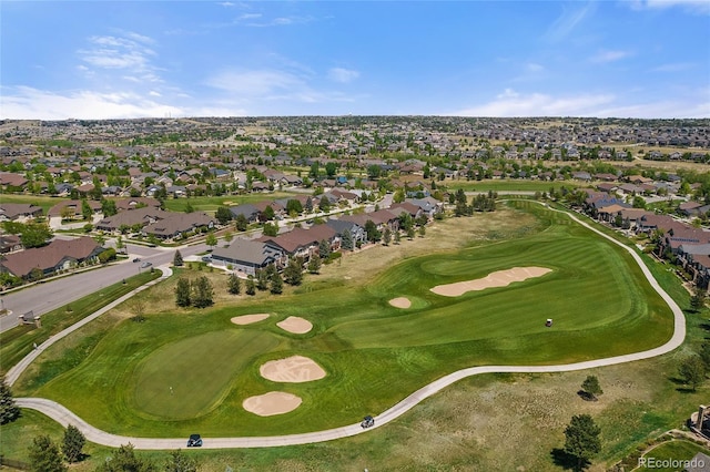 aerial overview of property's location featuring nearby suburban area and a local golf course