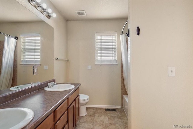 full bath featuring a sink and visible vents