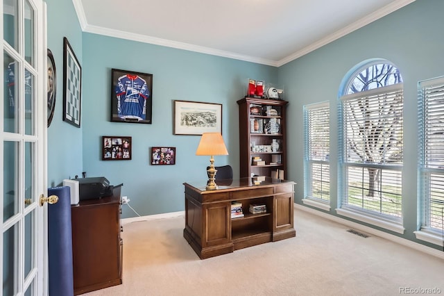 office with ornamental molding, visible vents, light carpet, french doors, and baseboards