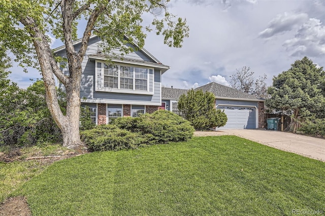 1758 S Ensenada St, Aurora, CO 80017 - view of front facade with brick siding, a front lawn, a garage, and driveway