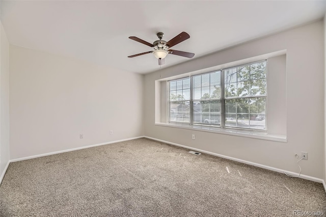 1758 S Ensenada St, Aurora, CO 80017 - empty room featuring carpet flooring, baseboards, and a ceiling fan