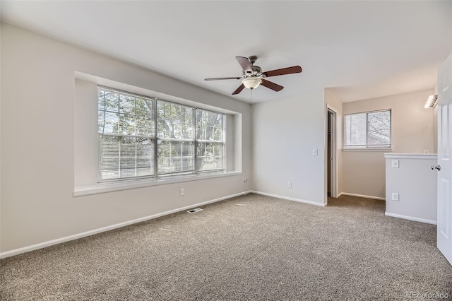 1758 S Ensenada St, Aurora, CO 80017 - unfurnished room with healthy amount of natural light, ceiling fan, carpet, and baseboards