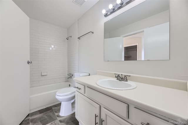 1758 S Ensenada St, Aurora, CO 80017 - bathroom featuring toilet, vanity, and shower / washtub combination