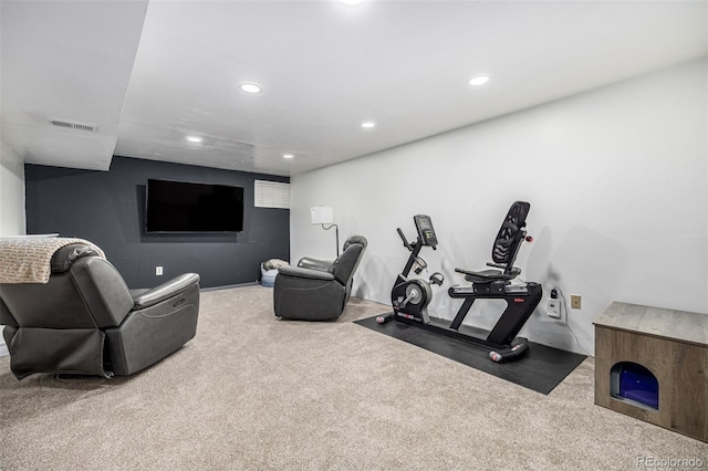 exercise area featuring carpet floors, visible vents, and recessed lighting