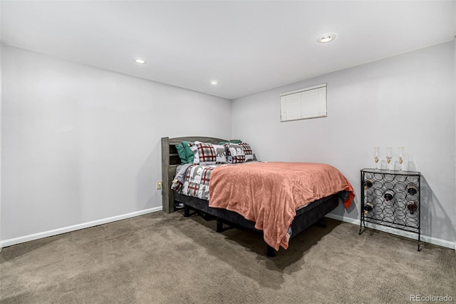 carpeted bedroom featuring recessed lighting and baseboards