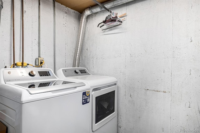 laundry area with laundry area and washing machine and dryer