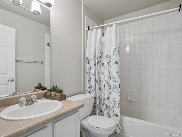 12348 W Dorado Pl Unit 204, Littleton, CO 80127 - bathroom featuring vanity, toilet, and shower / bathtub combination with curtain