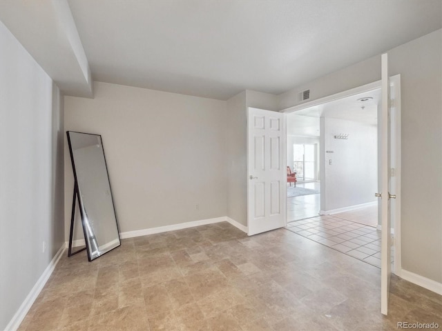12348 W Dorado Pl Unit 204, Littleton, CO 80127 - unfurnished room with baseboards