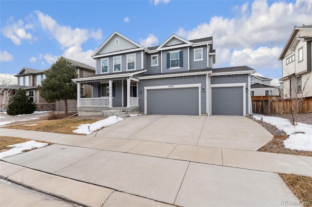 view of front of house with a garage and covered porch