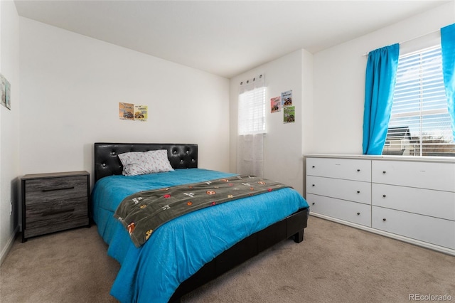 bedroom featuring carpet flooring