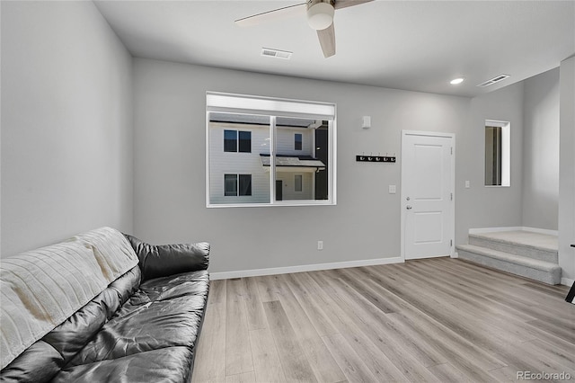 620 Apache Trl Unit A1, Ault, CO 80610 - living room featuring light wood finished floors and a ceiling fan