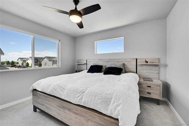 620 Apache Trl Unit A1, Ault, CO 80610 - carpeted bedroom featuring baseboards and a ceiling fan
